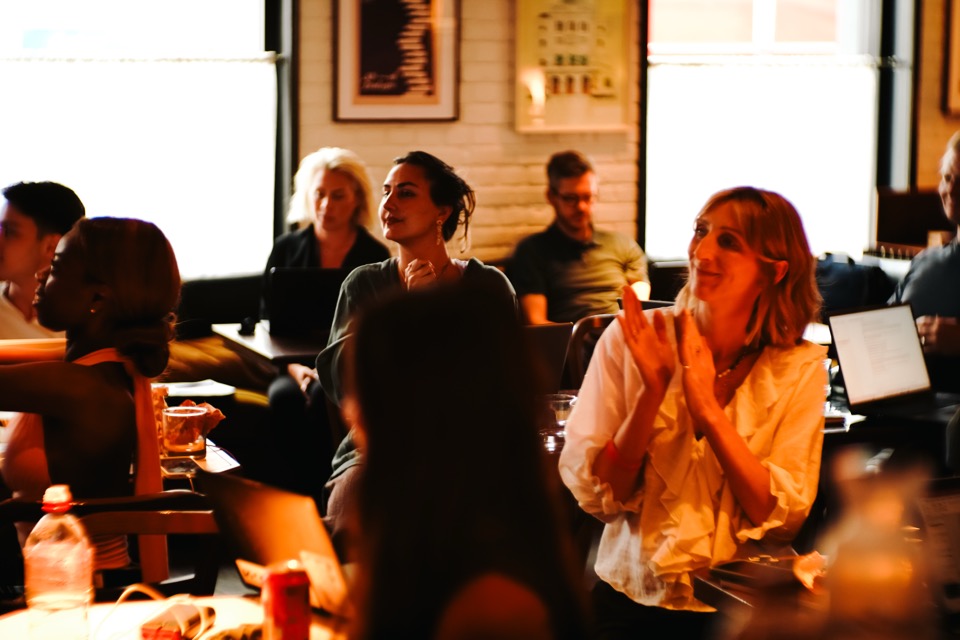 Members applauding a demo at a Light School meetup