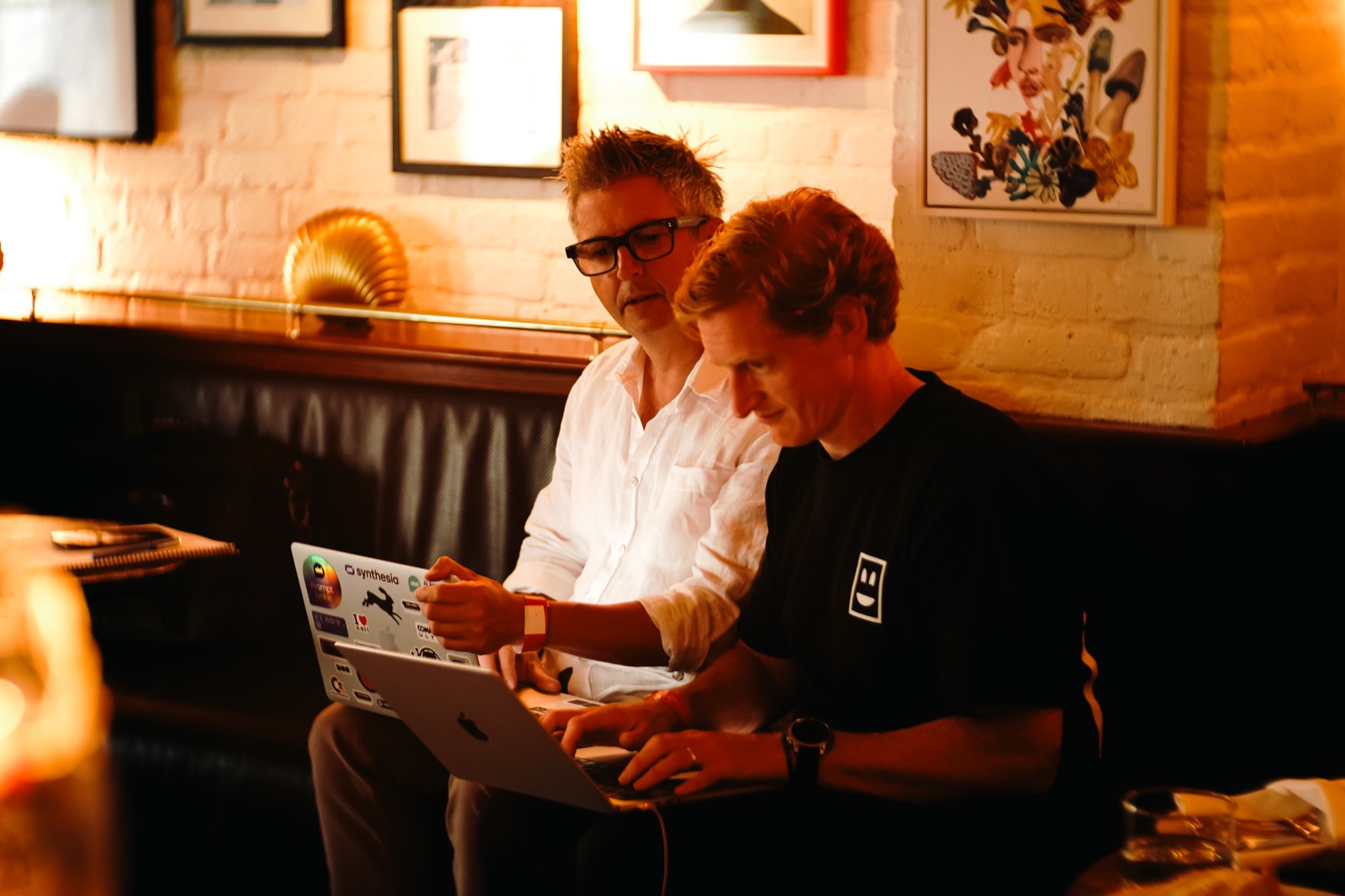 Two people building a project together with AI at a Light School session