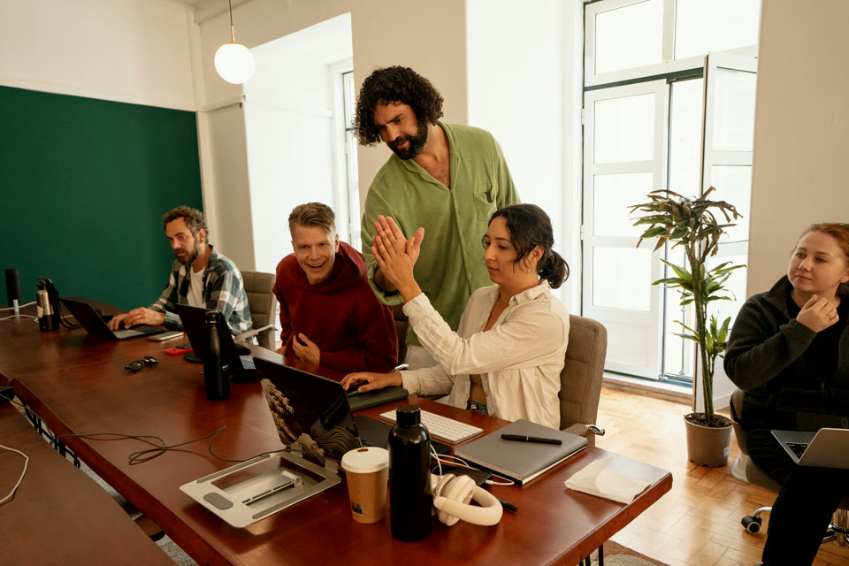 Nick Sarafa applauding a member who has just shipped their project